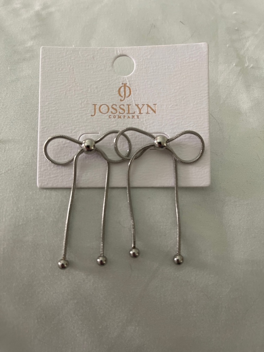 NWT Silver Bow Drop Earrings - Silver